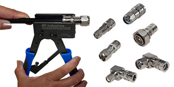 a hand squeezing a compression tool, putting a connector on a cable